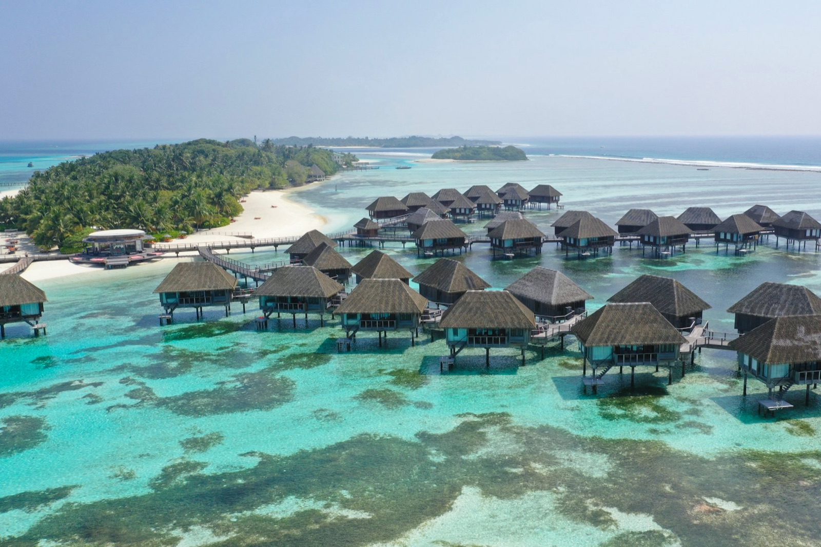 Villas over a turquoise lagoon in the Maldives