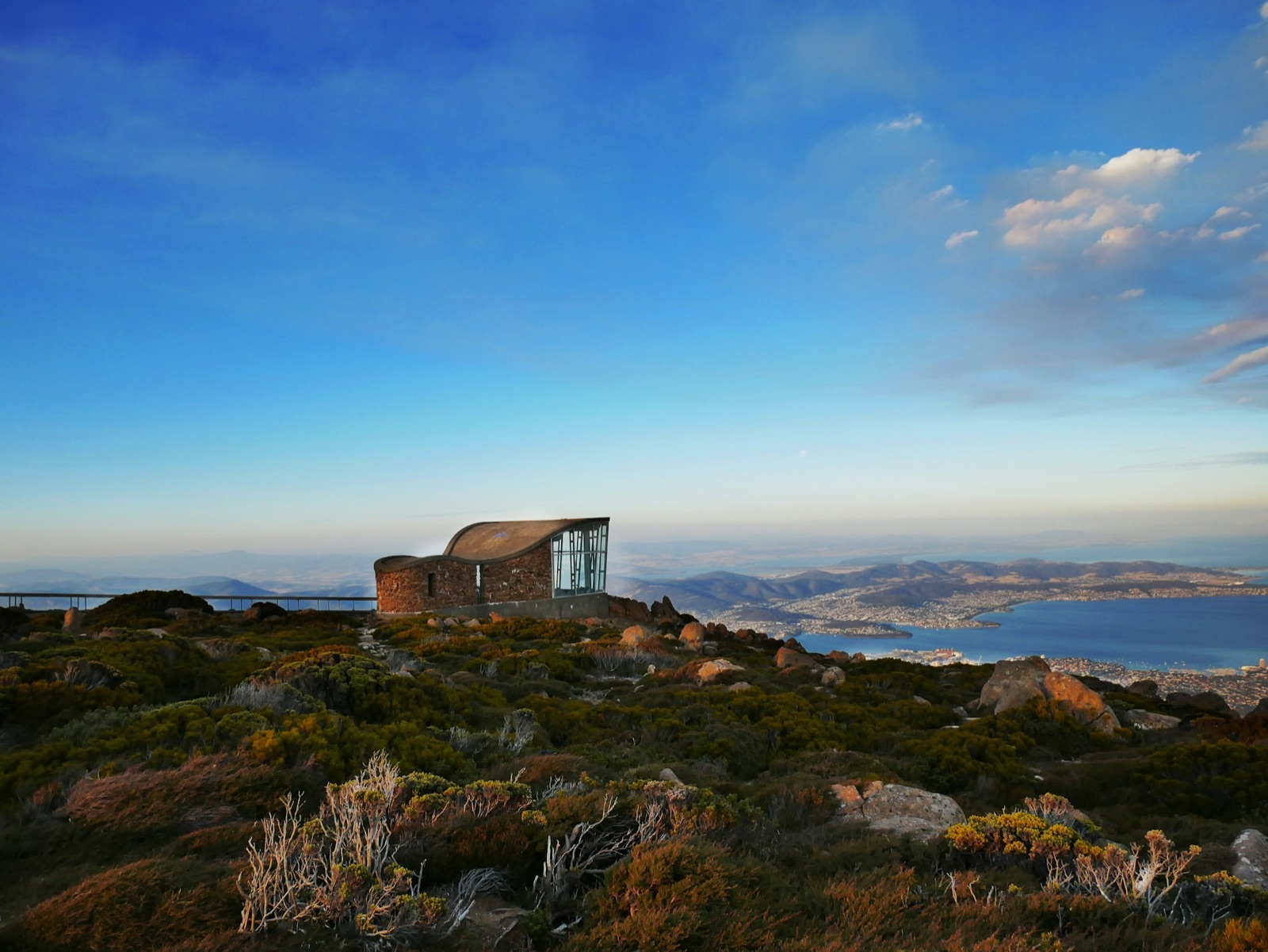 The summit shelter on kunanyi above Hobart and the estuary