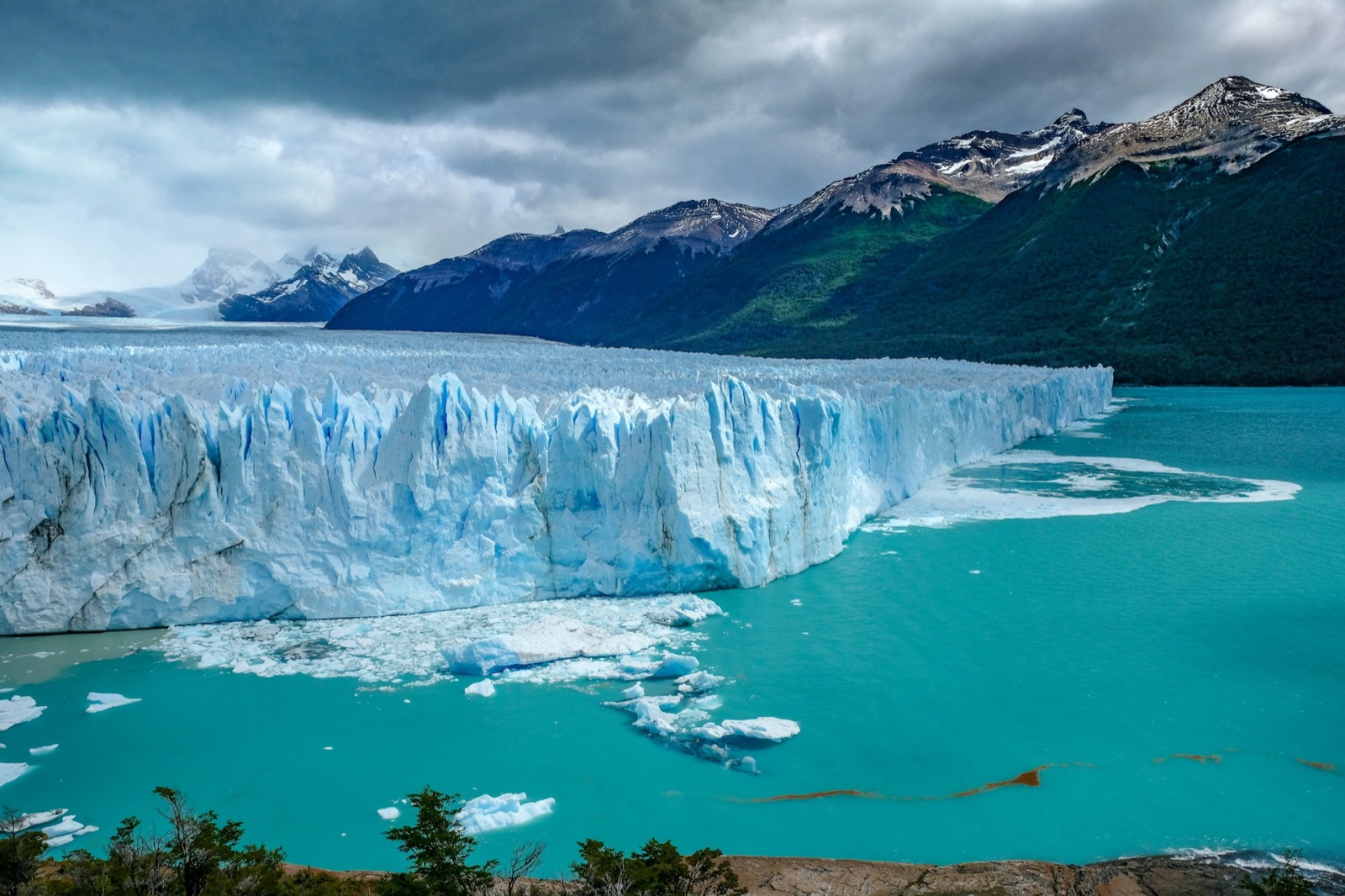 The Perito Moreno glacier front above turquoise meltwater